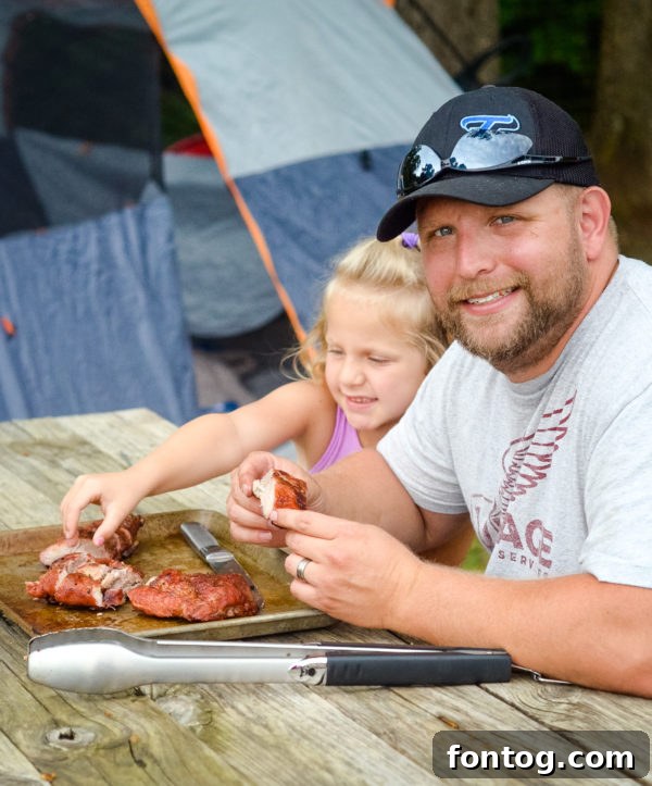 Child being comforted during a spooky campfire story