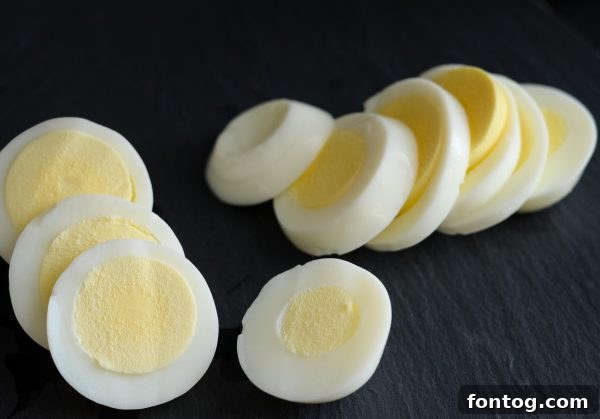 Air fryer basket showing perfectly cooked and browned beef slices