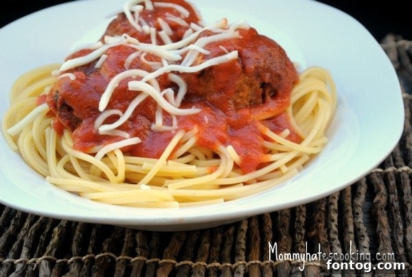 Perfectly Tender Slow Cooker Chicken Meatballs 2 Close-up of Slow Cooker Chicken Meatballs in pasta sauce