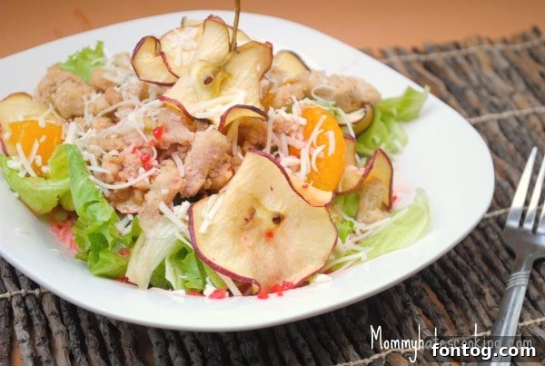 Apple Cider Salad with seasoned chicken, greens, and fruit
