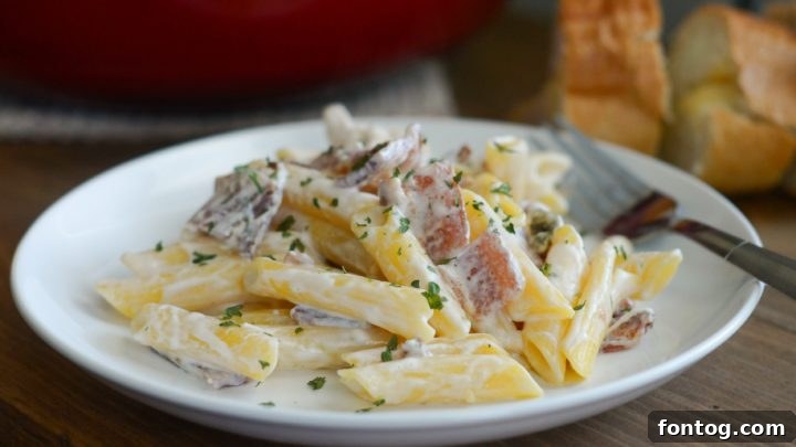 Creamy Penne Chicken Alfredo with Smoked Bacon.