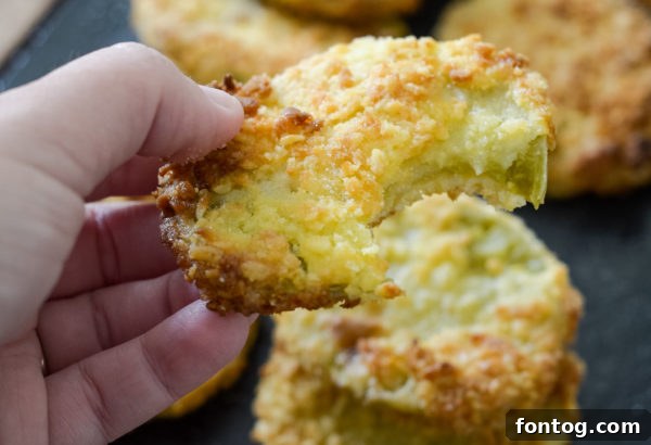 Crispy Gluten-Free Air Fryer Fried Green Tomatoes 5 Green tomatoes being breaded before air frying