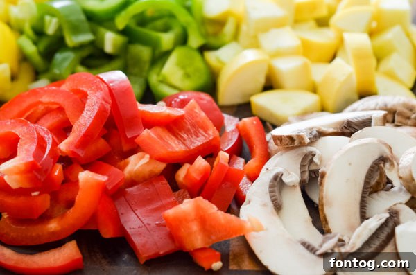 Two Ninja Foodi Steak and Vegetable Bowls side by side, showcasing the ingredients.