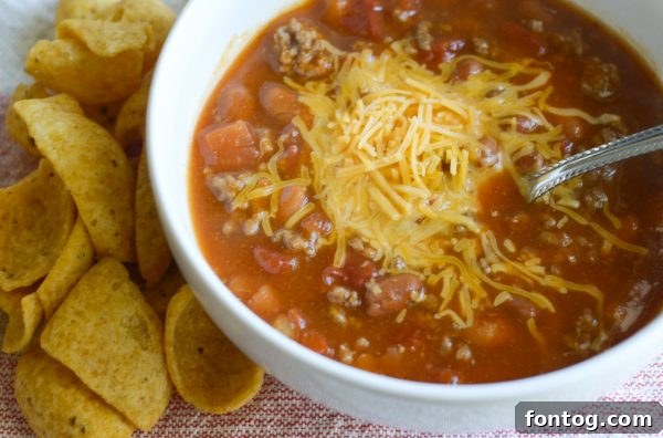 A vibrant weekly meal plan spread with various dishes like chili, chicken, and taquitos, showcasing organized home cooking.