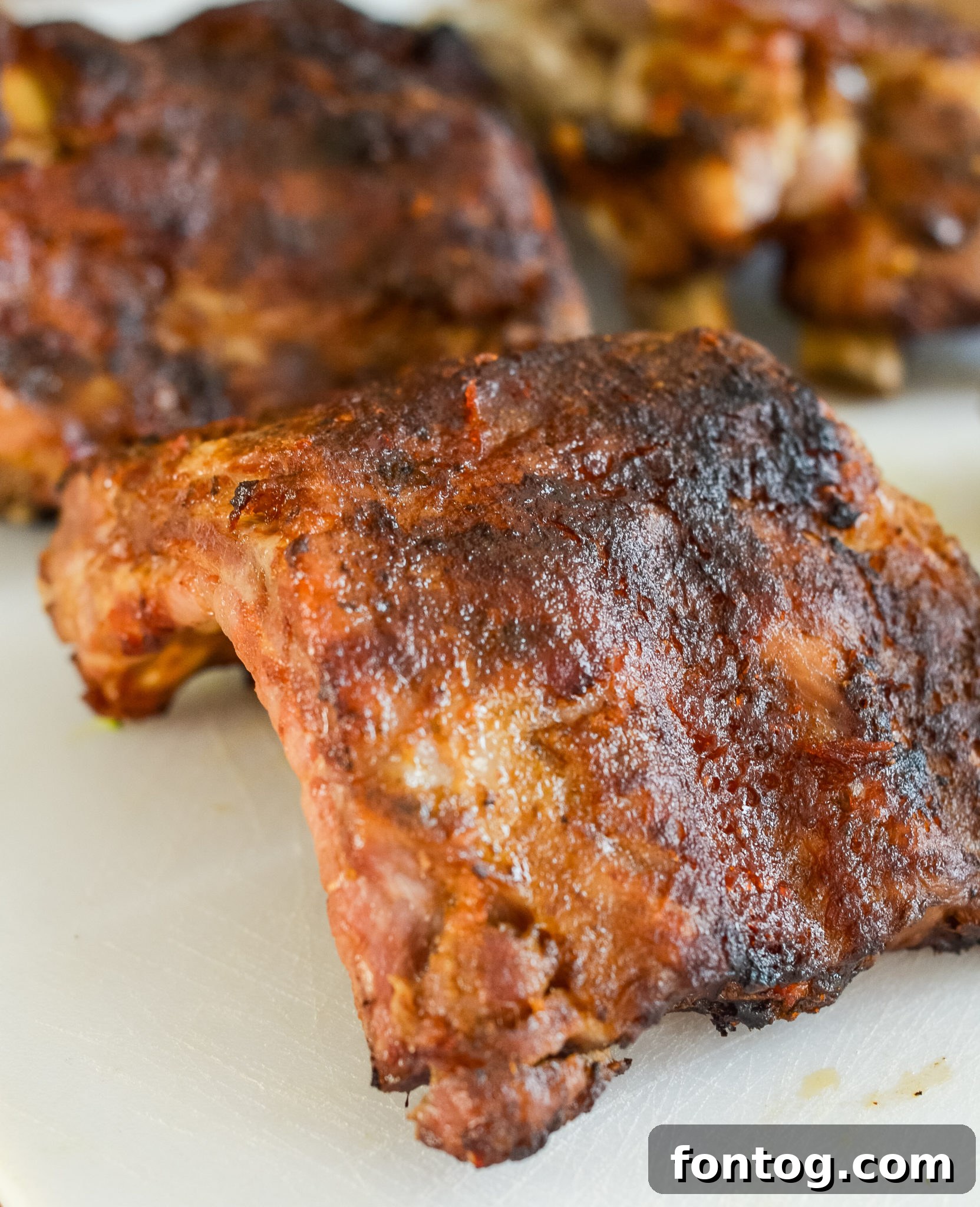 Cooked Ninja Foodi Baby Back Ribs with sauce