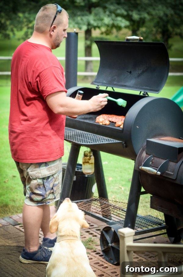 Touchdown Tailgate Dishes 4 Smiling couple holding Head Country products