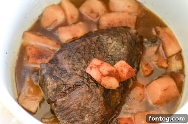Ninja Foodi with pressure cooker lid in slow cooker mode, set to vent