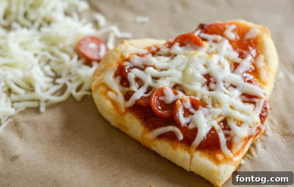 Air Fryer Pizza Lunch Box Kits components laid out: mini pizza crusts, sauce, cheese, pepperoni