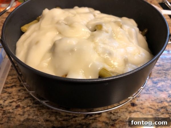 Ninja Foodi Express Chicken and Stuffing 6 Ninja Foodi Multi-Purpose Pan placed on the wire rack inside the Ninja Foodi