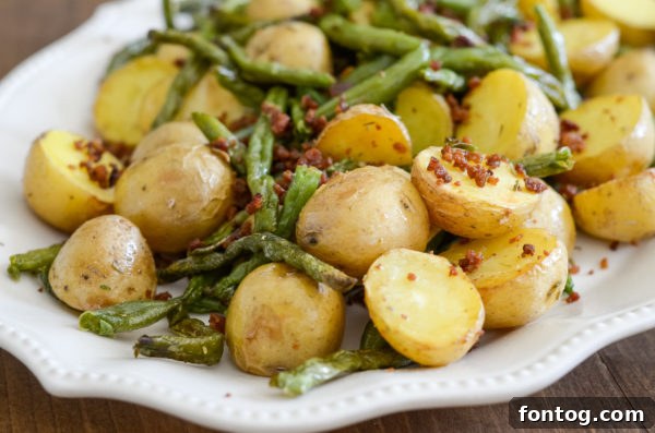 Crispy air fryer green beans and potatoes, a simple side dish.