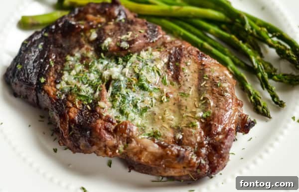 Close-up of a perfectly cooked and sliced garlic butter ribeye