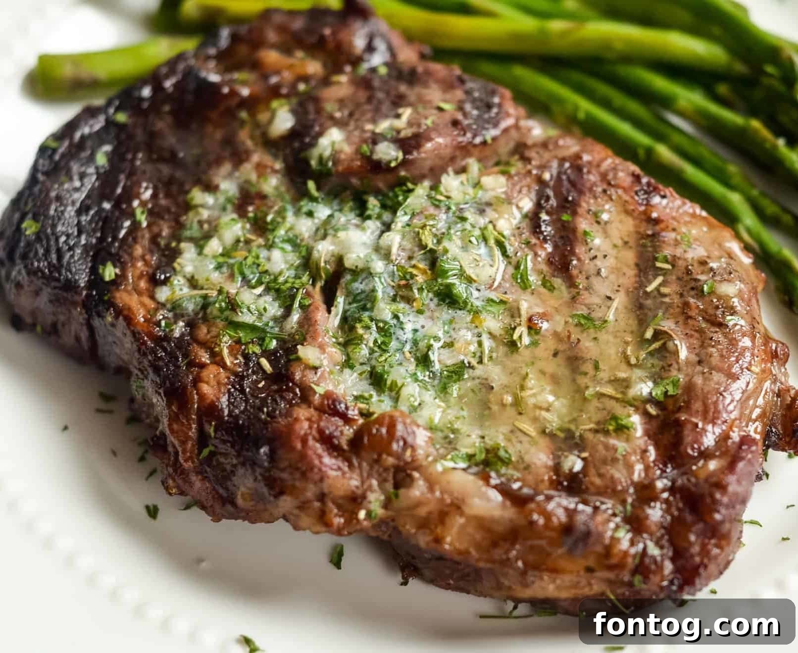 Garlic Butter Ribeyes on a serving platter