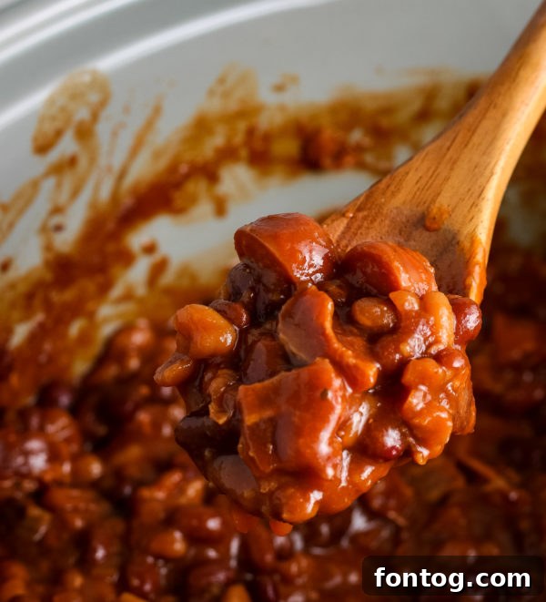 Close-up of Ninja Foodi Baked Beans with hot dogs