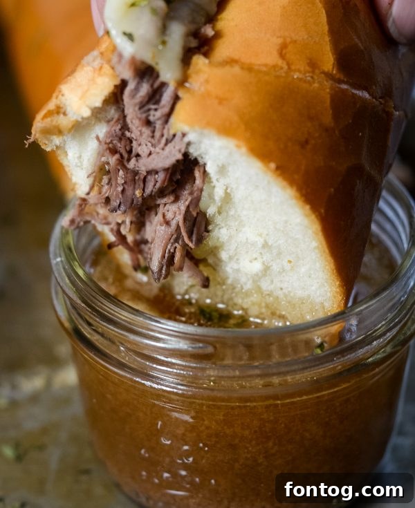 Delicious slow cooker french dip sandwiches, perfect for a family meal.