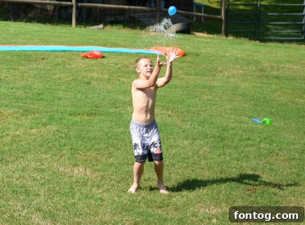 Backyard Bash: Your Family's Ultimate Game Night 16 Water guns laid out for a family water fight