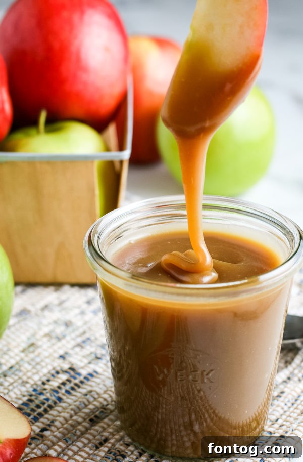 Velvety Gluten-Free Caramel Sauce 2 Classic Homemade Caramel Sauce (Gluten-Free) poured over apples