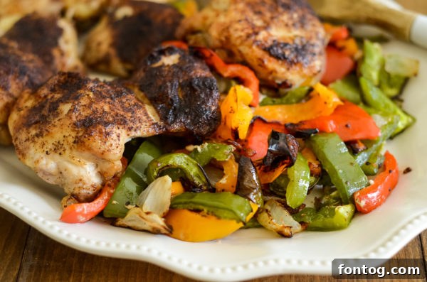 Perfectly grilled chicken fajitas with colorful vegetables, ready to serve