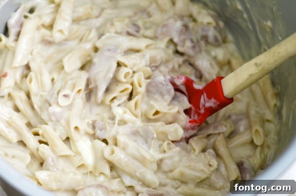 Ninja Foodi Chicken Alfredo - Pasta cooking in the pot