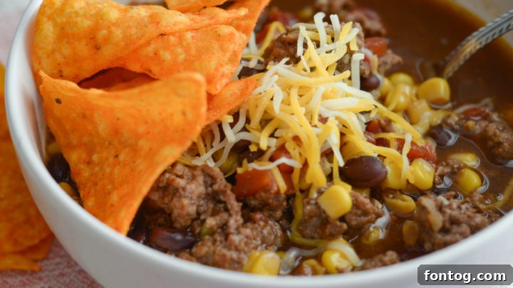 Hearty and flavorful Slow Cooker Beef Taco Soup for an easy dinner.