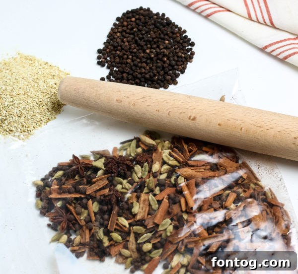 Cozy Mulling Spice Blend 4 Assortment of whole mulling spices laid out on a surface