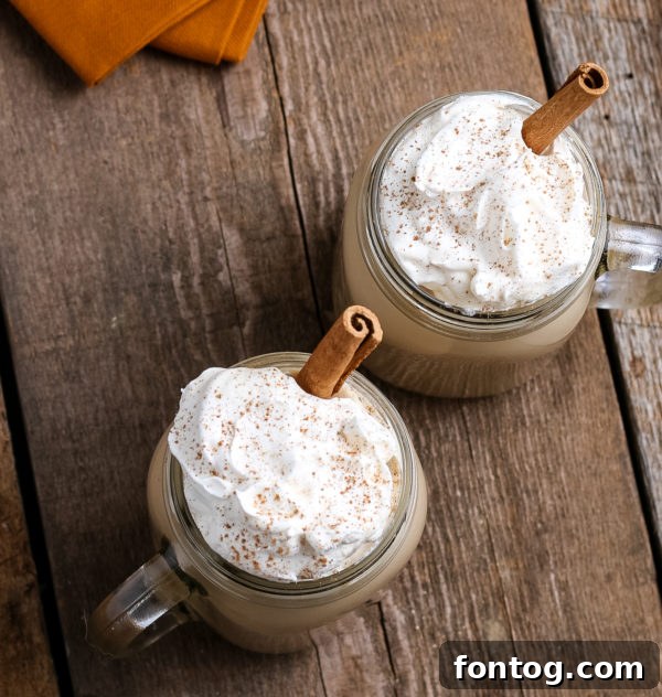 Crafting Your Perfect Pumpkin Spice Latte 3 Close-up of a Homemade Pumpkin Spice Latte with cinnamon stick garnish