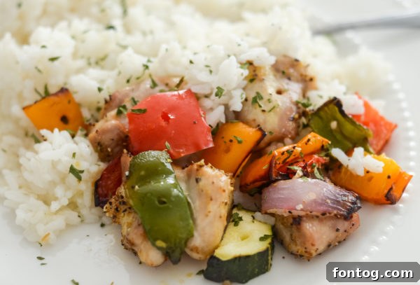 Cooked Ninja Foodi Chicken Kabobs on a plate, ready to be served.