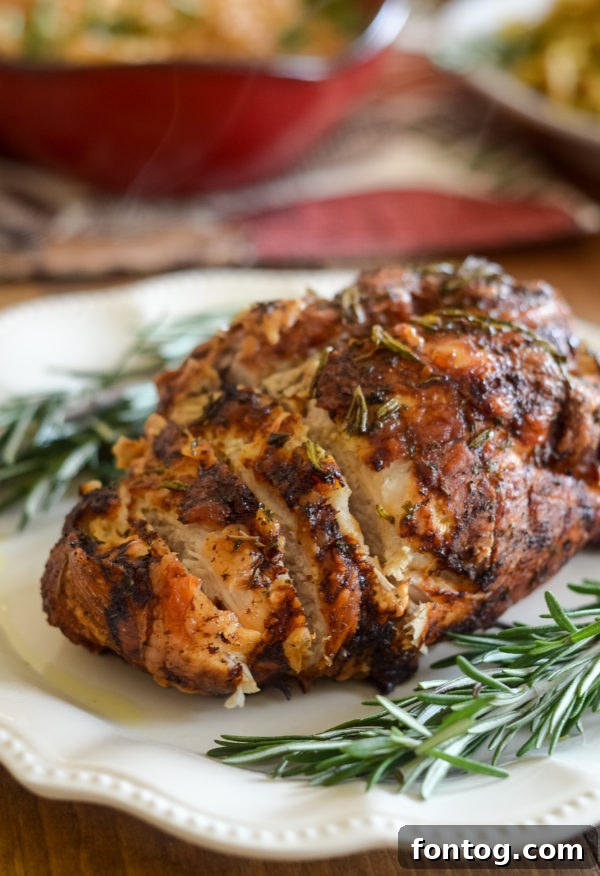 Crispy Air Fried Turkey with Rosemary and Garlic, sliced and ready to serve.