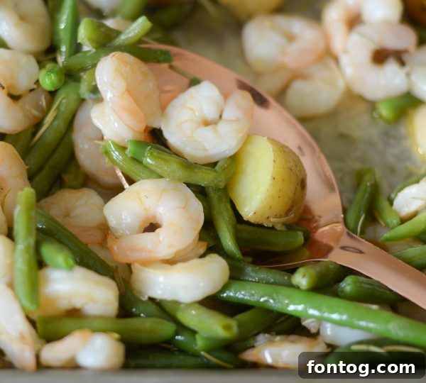 Delicious sheet pan garlic rosemary shrimp, a perfect easy weeknight meal idea.