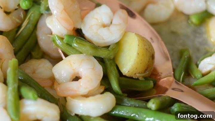 Easy Garlic Rosemary Shrimp Sheet Pan Dinner Recipe, minimal cleanup.