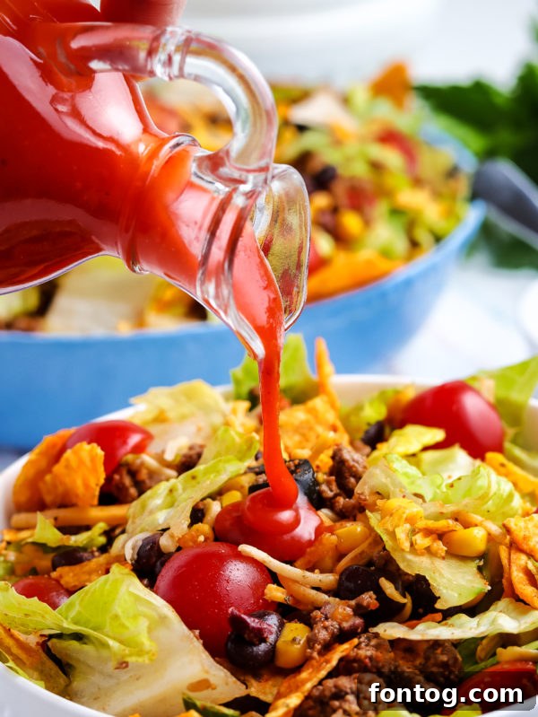 Crunchy Dorito Taco Fiesta 7 Bowl of Dorito Taco Salad with a variety of toppings