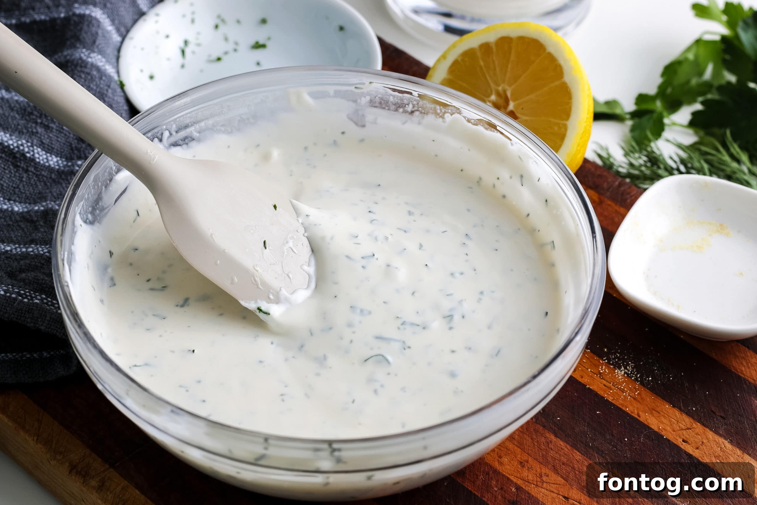 Unbottling Freshness Your Homemade Ranch Upgrade 4 Close-up of Homemade Ranch Dressing in a Bowl with Spoon