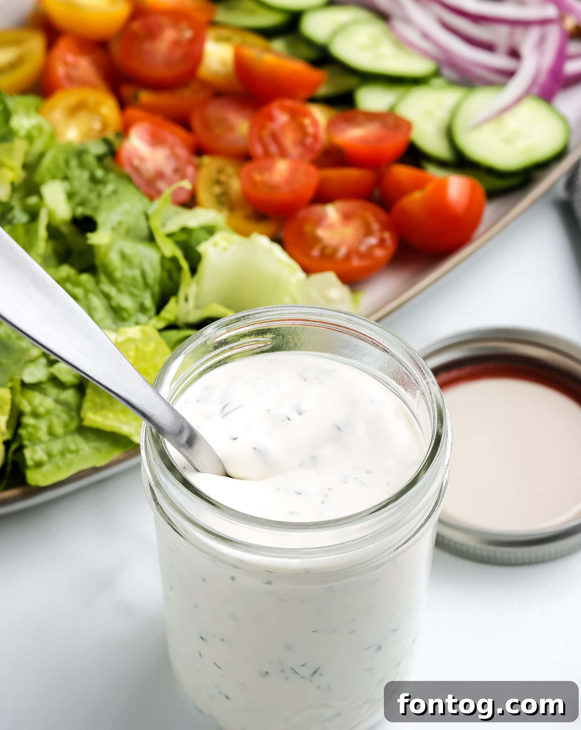Unbottling Freshness Your Homemade Ranch Upgrade 5 Glass of Buttermilk next to Homemade Ranch Dressing
