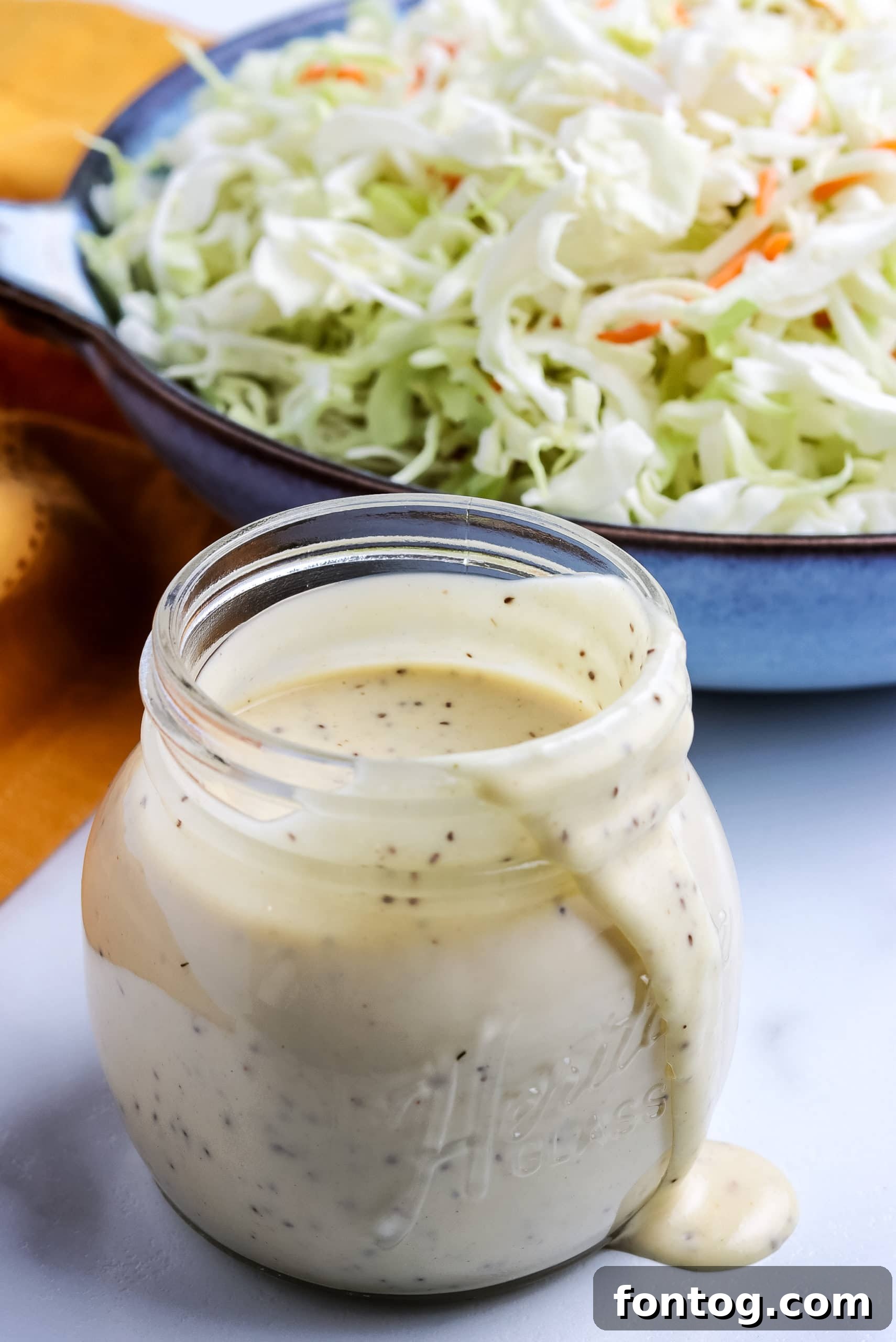 How to Make Coleslaw Dressing - A batch of creamy coleslaw in a serving bowl