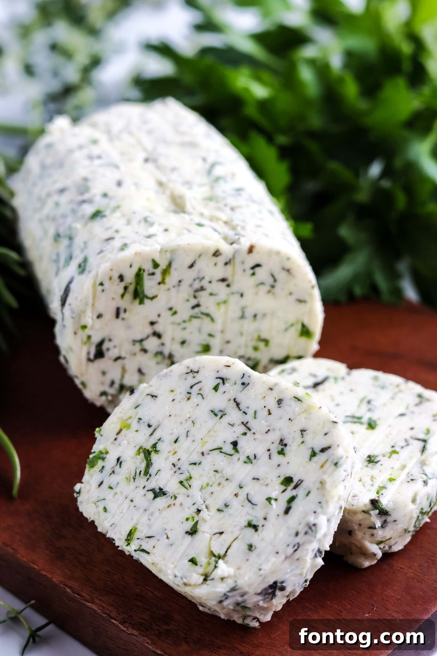 Fresh Herb Butter (Compound Butter) served on bread slices, garnished with fresh herbs