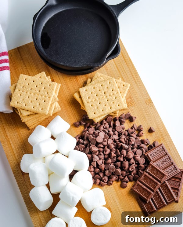 Effortless S'mores Treat 3 Ingredients for S'mores Dip including chocolate chips and marshmallows
