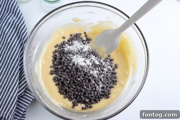 Ingredients for gluten-free chocolate chip muffins laid out, including a bag of gluten-free flour and chocolate chips.