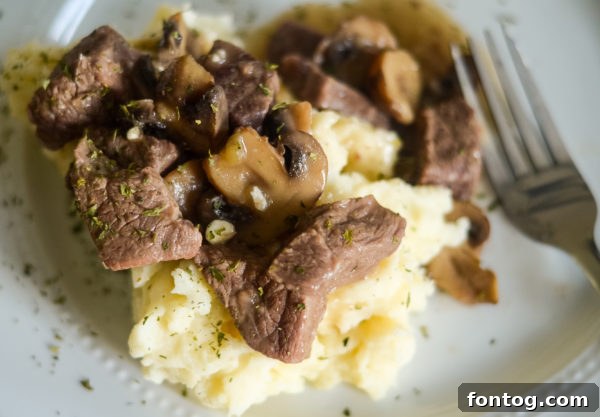 ingredients for Ninja Foodi beef tips including onions, mushrooms, and spices