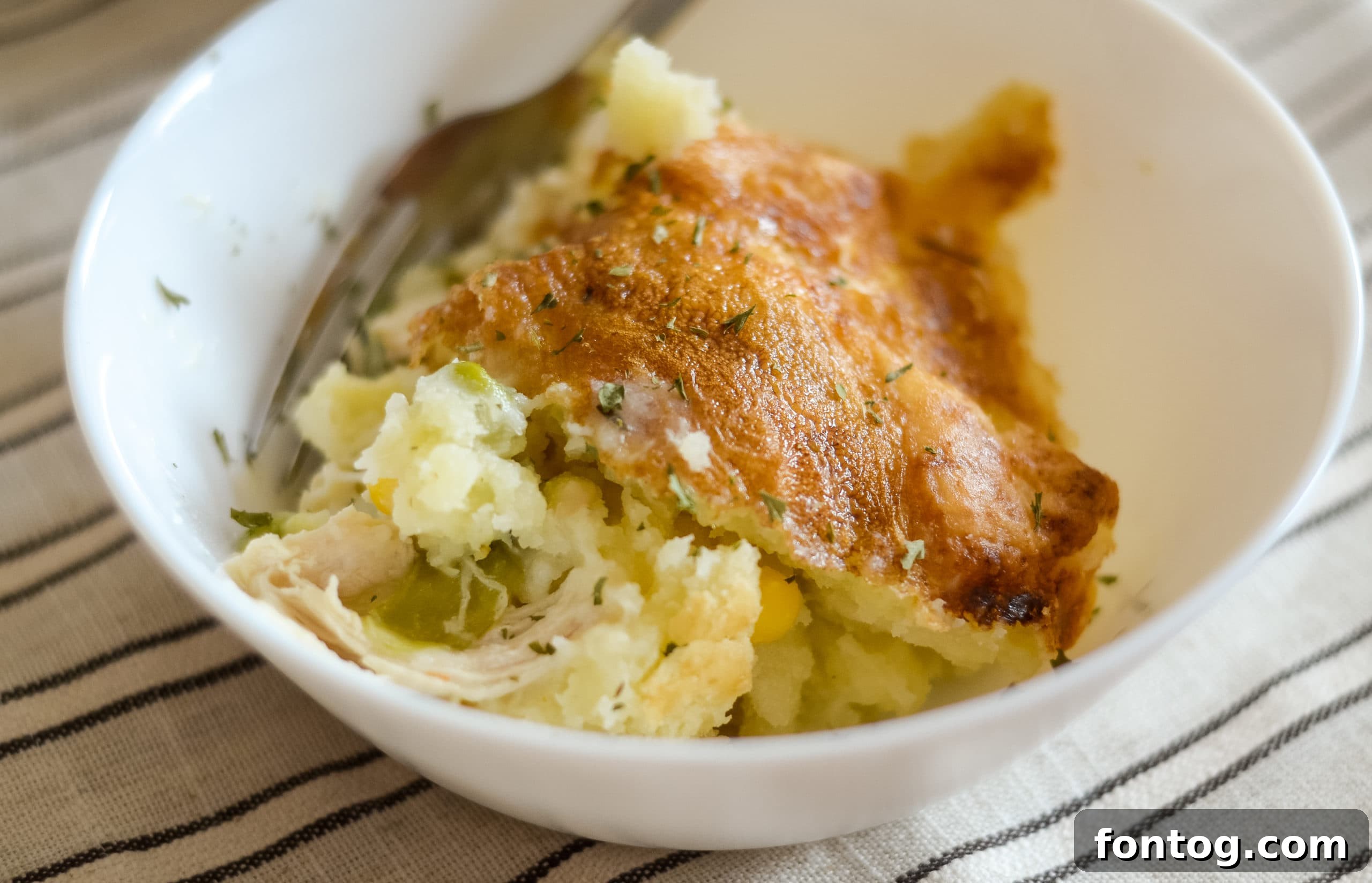 Ingredients for gluten-free chicken pot pie layered in the Ninja Foodi pot.