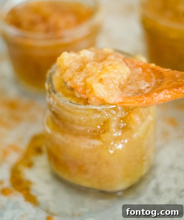 Ninja Foodi with the pressure cooker lid sealed and cooking applesauce.