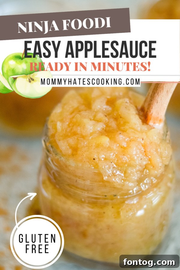 A visually appealing pin image for Ninja Foodi applesauce, showing a bowl of applesauce and fresh apples.