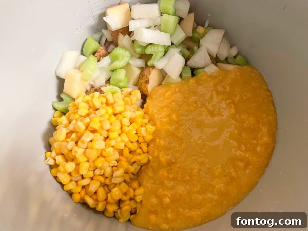 Close-up of Ninja Foodi Corn Chowder, highlighting its creamy texture and fresh ingredients.