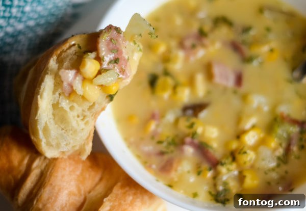 Another appealing view of the Ninja Foodi Corn Chowder in a rustic bowl.