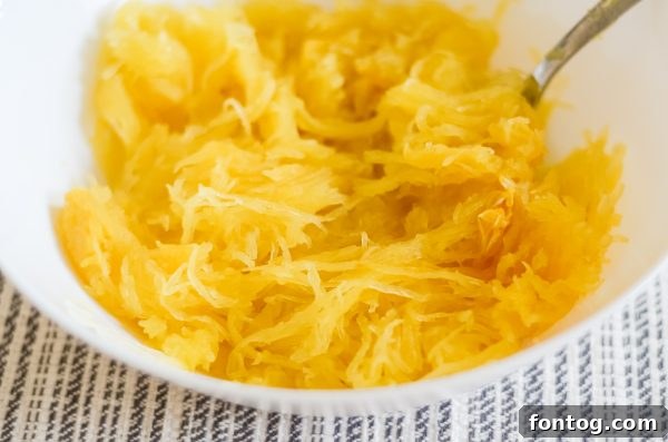 Perfect Spaghetti Squash in Your Ninja Foodi 6 cooked ninja foodi spaghetti squash strands in a bowl