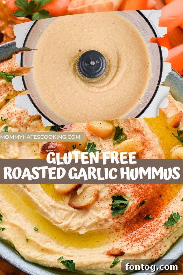 A festive platter of roasted garlic hummus, surrounded by various fresh vegetables and crackers, making a beautiful and healthy spread.