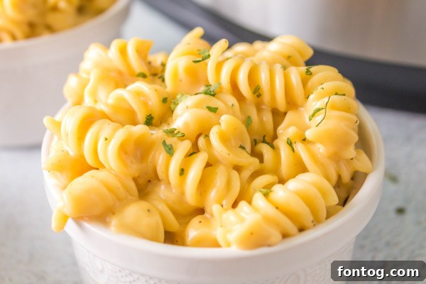 mixing cheese for mac and cheese