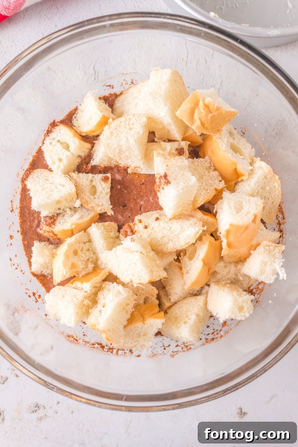 Ultimate Ninja Foodi French Toast Bake 3 Diced bread ready for Ninja Foodi French Toast Casserole