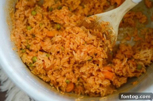 Ninja Foodi lid with the pressure release valve in the 'SEAL' position, ready for cooking Spanish rice.