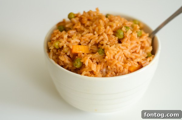 Delicious Ninja Foodi Spanish Rice, stirred and ready to be served as a side dish.