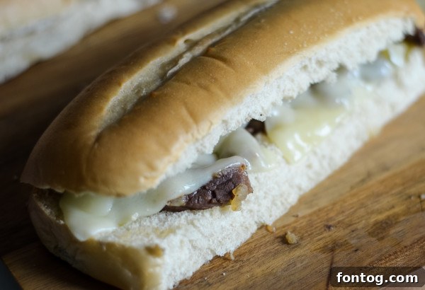 Ninja Foodi Philly Cheesesteak Perfection 5 sauteing onions in Ninja Foodi for cheesesteak