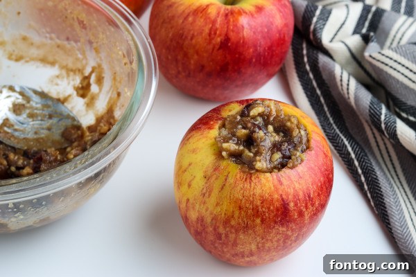 The process of coring an apple, showing the cavity created for the filling